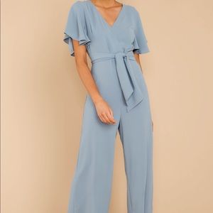 Red dress dusty blue jumpsuit